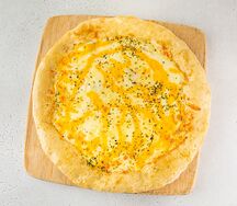 Пицца четыре сыра