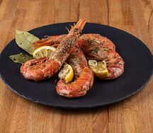 Жареные лангустины на лимонах