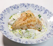 Ньокки тыквенные с пармезаном, окунем и белым соусом 