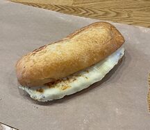 Раклет с расплавленным сыром