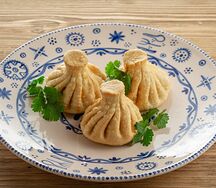 Хинкали с телятиной и свининой, обжаренные в масле