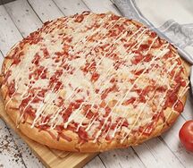 Пицца с ветчиной (1 кг)