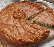 Пирог с зеленым луком и яйцом из печки