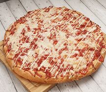 Пицца с ветчиной на пышном тесте