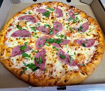 Пицца с ветчиной 