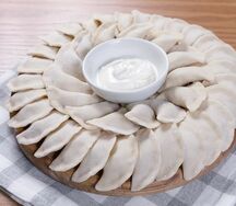 Замороженные вареники с грибами и картофелем