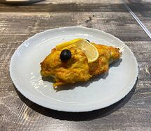 Судак, запечённый под овощами