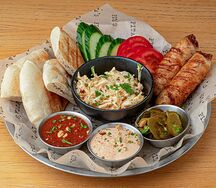 Тарелка с купатами