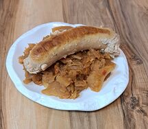 Тушёная капуста с куриной купатой