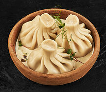 Хинкали с картофелем и грибами в сливочном соусе