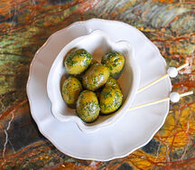 Маринованные оливки с гремолатой