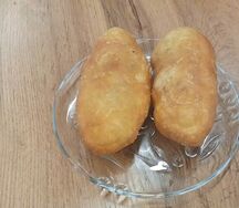 Пирожок с рисом и яйцом жареный