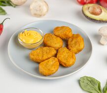 Наггетсы куриные с сырным соусом