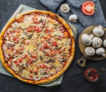 Пицца с ветчиной и грибами большая
