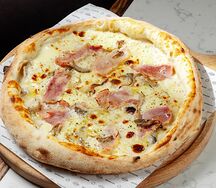Пицца с ветчиной маранелло