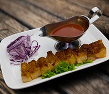 Бараний курдюк на мангале