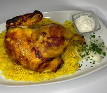 Половина курицы гриль с рисом