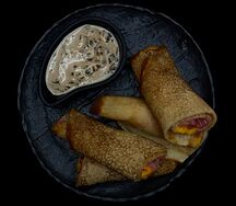 Блинчики с ветчиной, сыром и грибным соусом