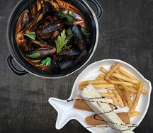 Мидии в томатном соусе