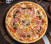 Пицца с ветчиной и грибами