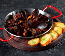 Мидии в томатном соусе