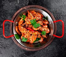 Креветки жареные в соусе том ям