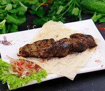 Шашлык из говяжьей печени на мангале