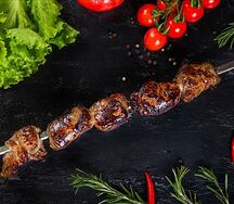 Говяжья печень в бараньей жировой сетке