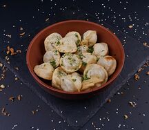 Пельмени жареные 