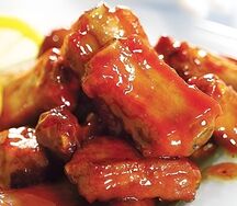 Свиные ребрышки в кисло-сладком соусе