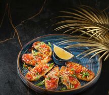 Мидии киви, запеченные под сырно-острым соусом 