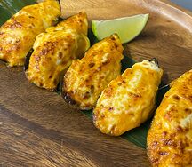 Мидии, запеченные в сырном соусе том ям