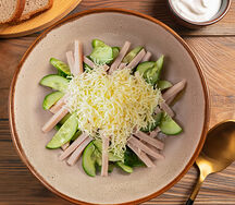 Салат Каприз с ветчиной и сыром