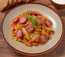 Капуста тушеная с сосисками