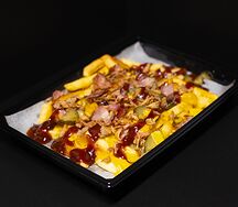 Картофель с беконом в сырном соусе