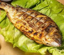 Дорадо на мангале