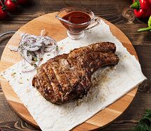 Стейк из свинины на косточке