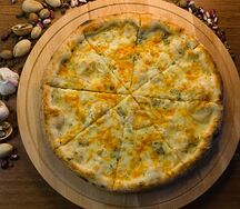 Пицца Четыре сыра с трюфельным маслом