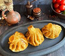 Жареные хинкали с бараниной