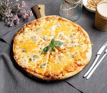 Пицца четыре сыра