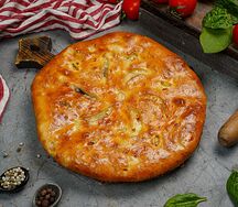 Осетинский пирог с мясом и зеленью