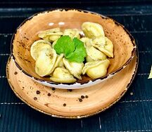 Пельмени со свининой и капустой