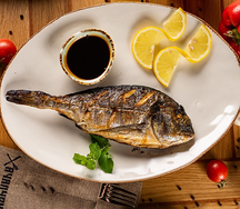 Дорадо на мангале