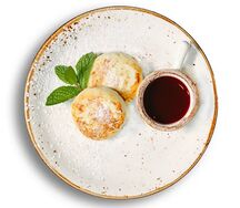 Сырники с малиновым соусом