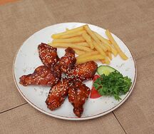 Куриные крылышки в кисло-сладком соусе
