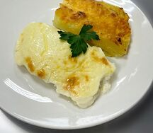 Треска, запеченная под сыром с грибами