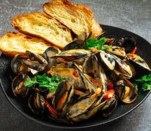 Мидии в сливочном соусе