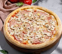 Пицца с ветчиной и грибами