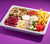 Шаверма Макси на тарелке с картофелем фри