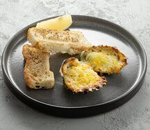 Запеченная импортная устрица под соусом дорблю